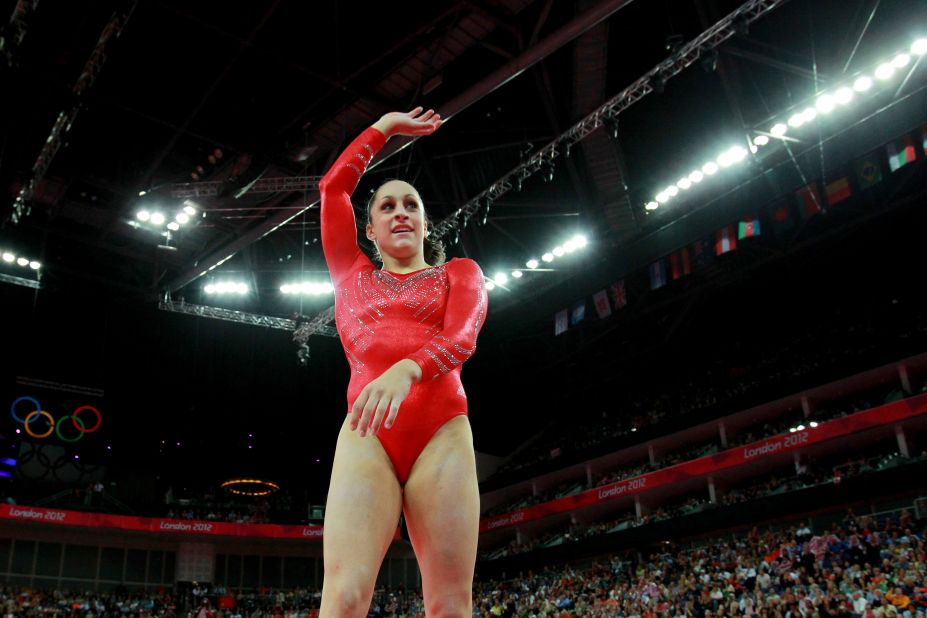 Jordyn Wieber of the United States waves after competing on the floor exercsise in the gymnastics event.