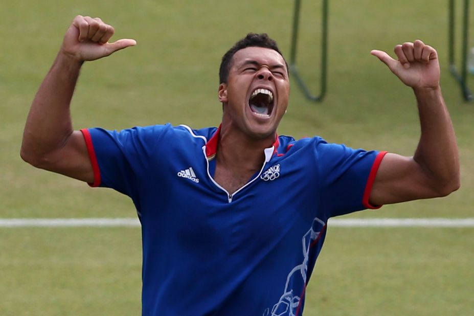Jo-Wilfried Tsonga shouts for joy as he finds the shot that seals victory in the longest Olympic tennis match. The match lasted just under four hours and the final set ended 25-23 to the fifth-seeded Frenchman.
