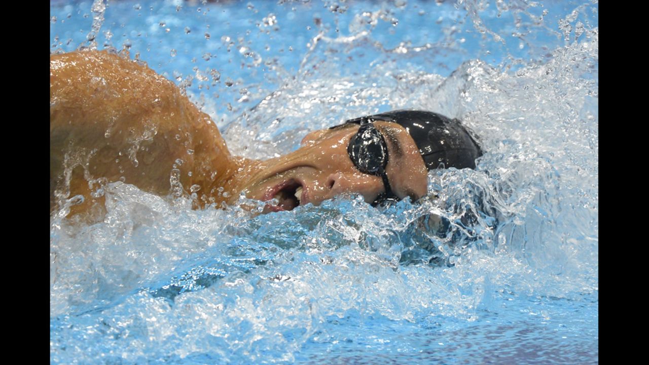 American Michael Phelps competes in the men's 4x200-meter freestyle relay final. 