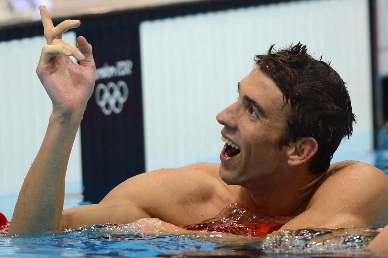 Phelps celebrates in 2012 after becoming the most-decorated Olympic athlete in history. He had just won his 19th medal after the 4x200 freestyle.