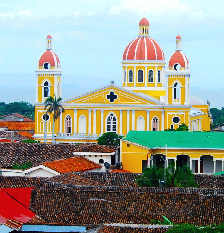 Granada, on the shores of Lake Nicaragua, draws visitors with its beautiful architecture.