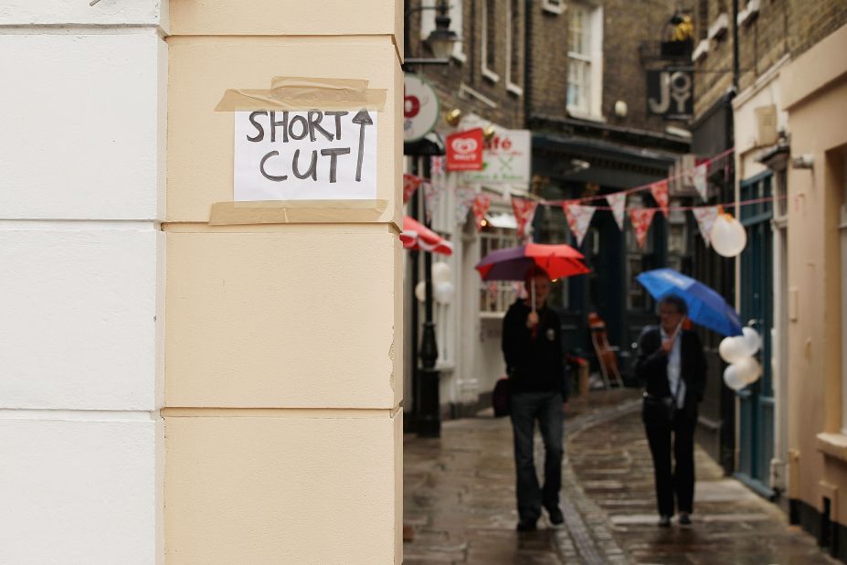 Pranksters have plastered London with "short cut" signs, leading unsuspecting spectators to France.