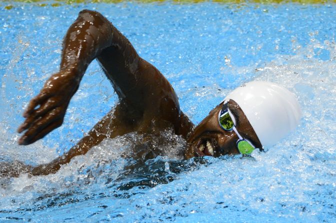 Ahmed Husam of the Maldives competes in the men's 100-meter freestyle heat Tuesday.