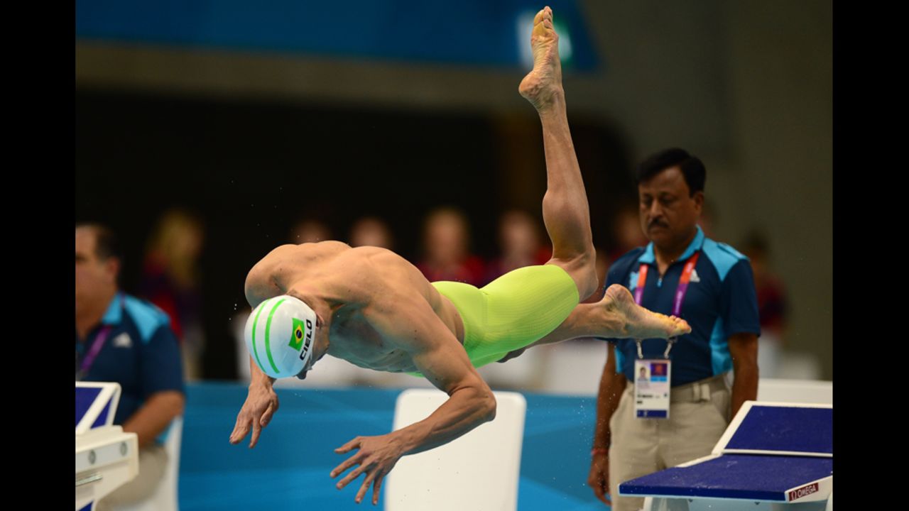 Brazil's Cesar Cielo dives in for the men's 100-meter freestyle heat Tuesday.
