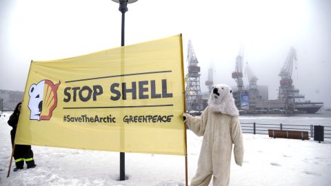 Greenpeace activists demonstrate in Helsinki as others occupy a Shell-contracted icebreaker preparing to sail for the Arctic.
