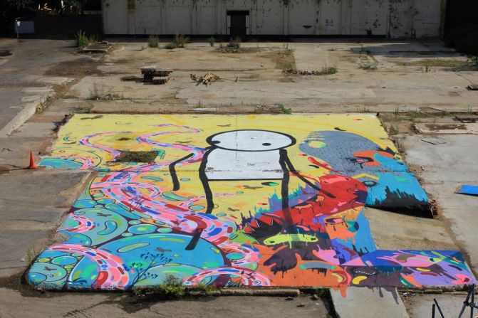 This collaborative piece between Stik, Milo Tchais and Prozak in Hackney Wick is now covered up by a hospitality tent.<br />