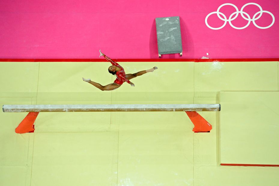 Gabrielle Douglas of the United States performs on the balance beam in the women's gymnastics team final.