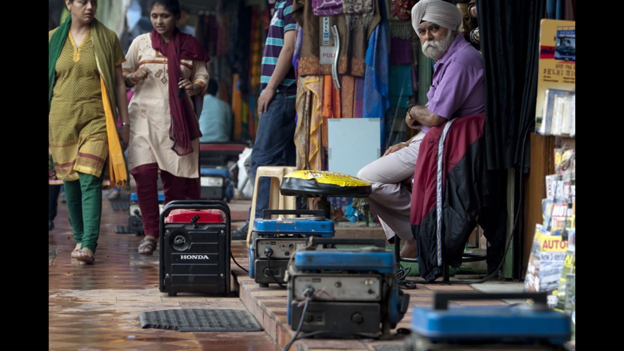 Portable generators provide electrical power to souvenir shops in Janpath Market, a popular tourist shopping area, in New Delhi on Tuesday.