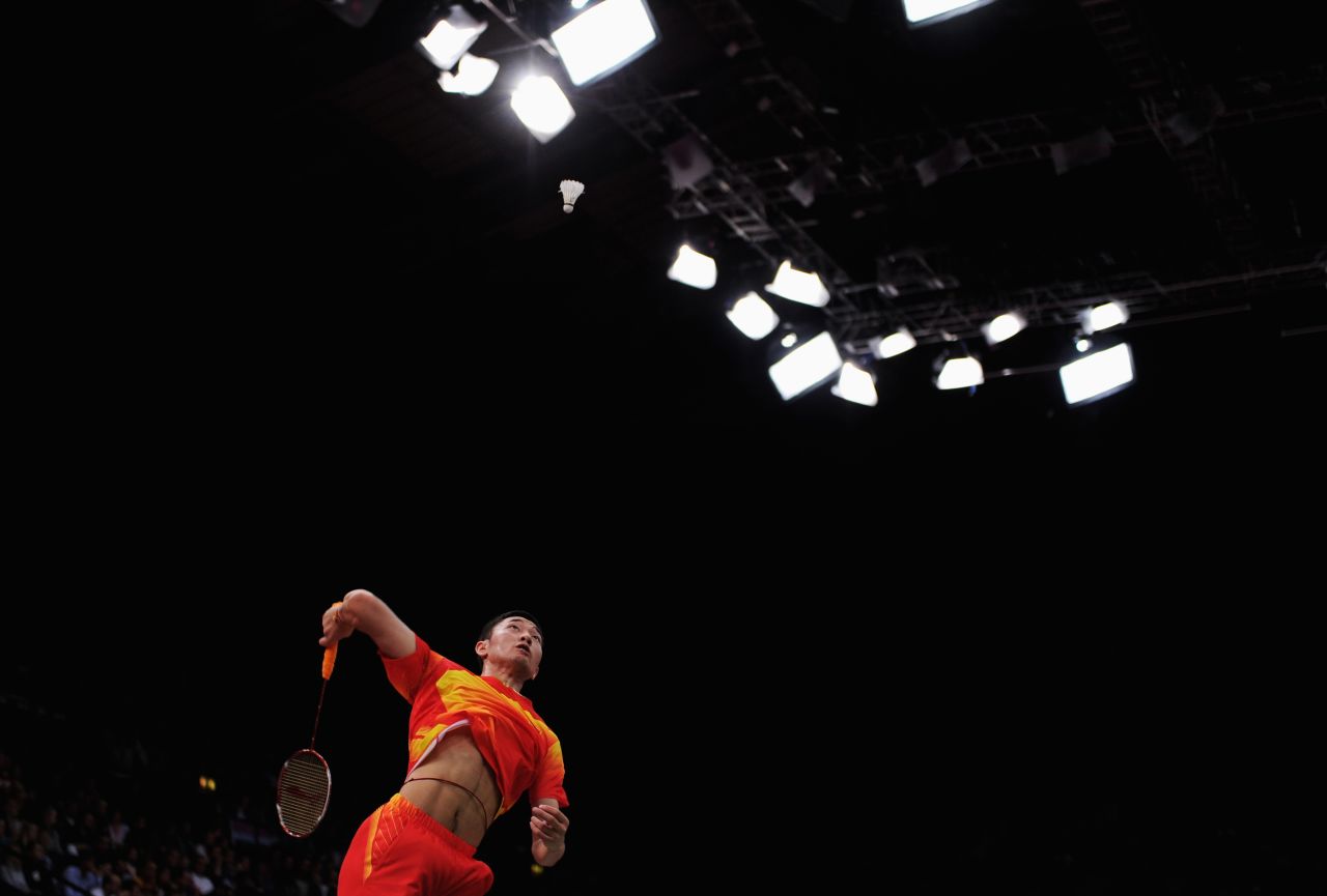 Biao Chai of China in action during a men's doubles badminton match against Denmark players Tuesday.
