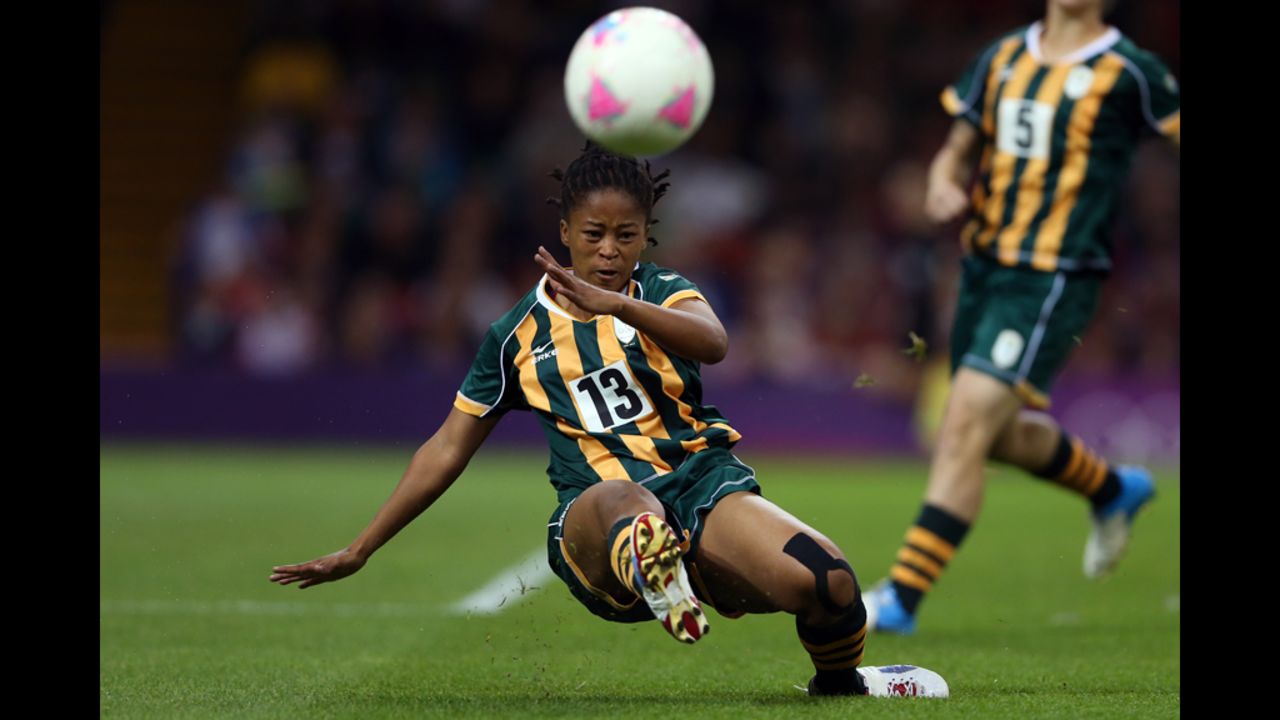 Gabisile Hlumbane of South Africa kicks the ball during the women's first-round soccer match against Japan.