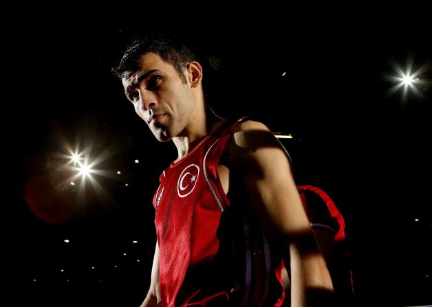 Ferhat Pehlivan of Turkey enters the ring before his boxing bout with Carlos Suarez of Trinidad and Tobago.