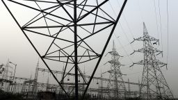 High voltage electricity towers stand on the outskirts of New Delhi. 