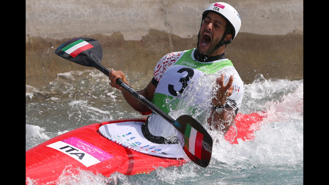 Daniele Molmenti of Italy celebrates winning the gold medal in the men's kayak single final.