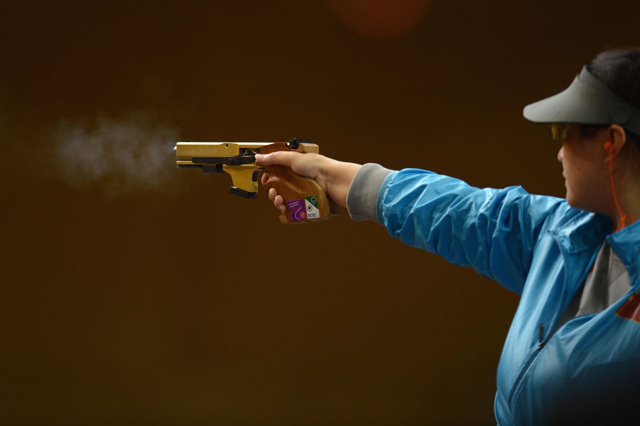 Ying Chen of China competes in the women's 25-meter pistol shooting final.