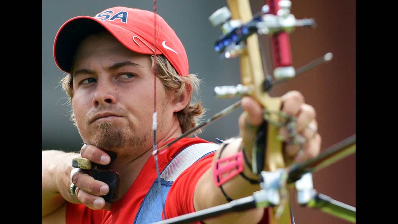 U.S. archer Brady Ellison competes against Mark Javier of the Philippines in the men's individual elimination match.