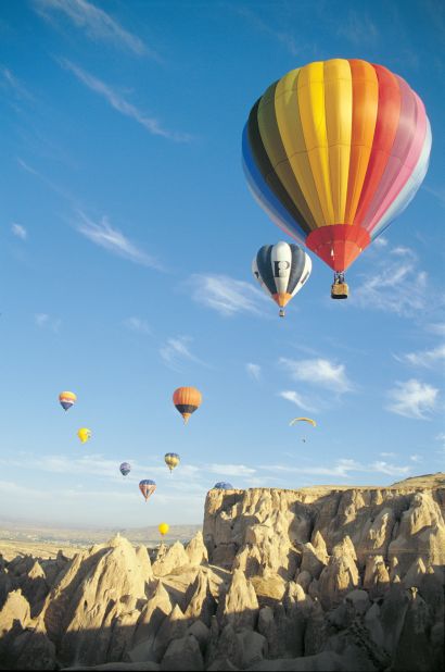After feasting on an open buffet, patrons of Royal Balloon ascend 1,000 feet into the air and travel through the region's otherworldly rock formations.