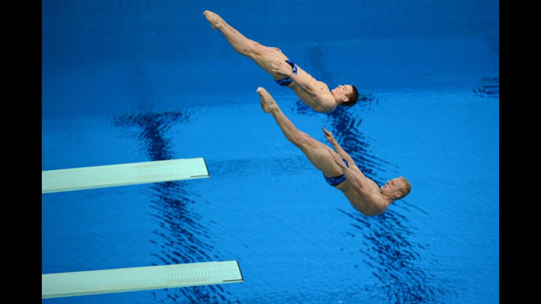 Russia's Ilya Zakharov and Evgeny Kuznetsov compete in the men's synchronized 3-meter springboard diving event.