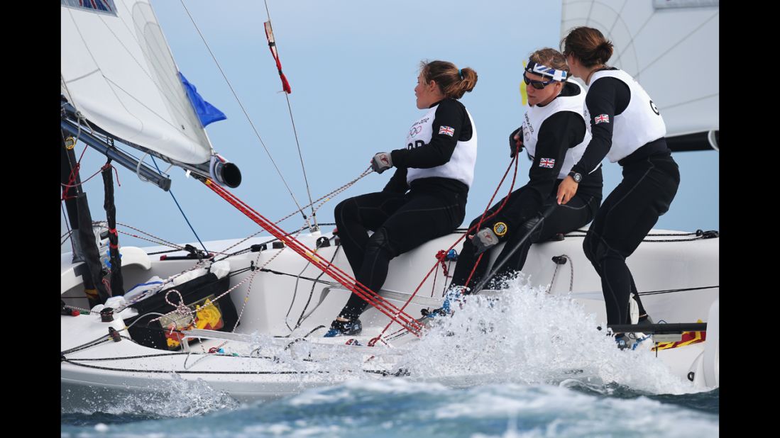 Kate Macgregor, left, Annie Lush and Lucy Macgregor of Great Britain compete in the Women's Elliott 6-meter WMR sailing event.