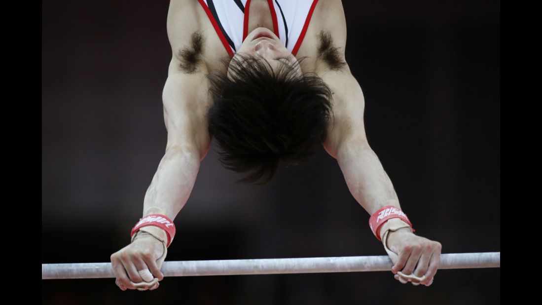 Japan's Kohei Uchimura performs on the horizontal bar during the men's individual all-around competition.