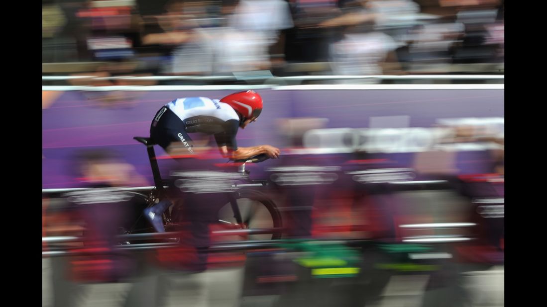 Bradley Wiggins of Britain competes in men's individual time trial road cycling.