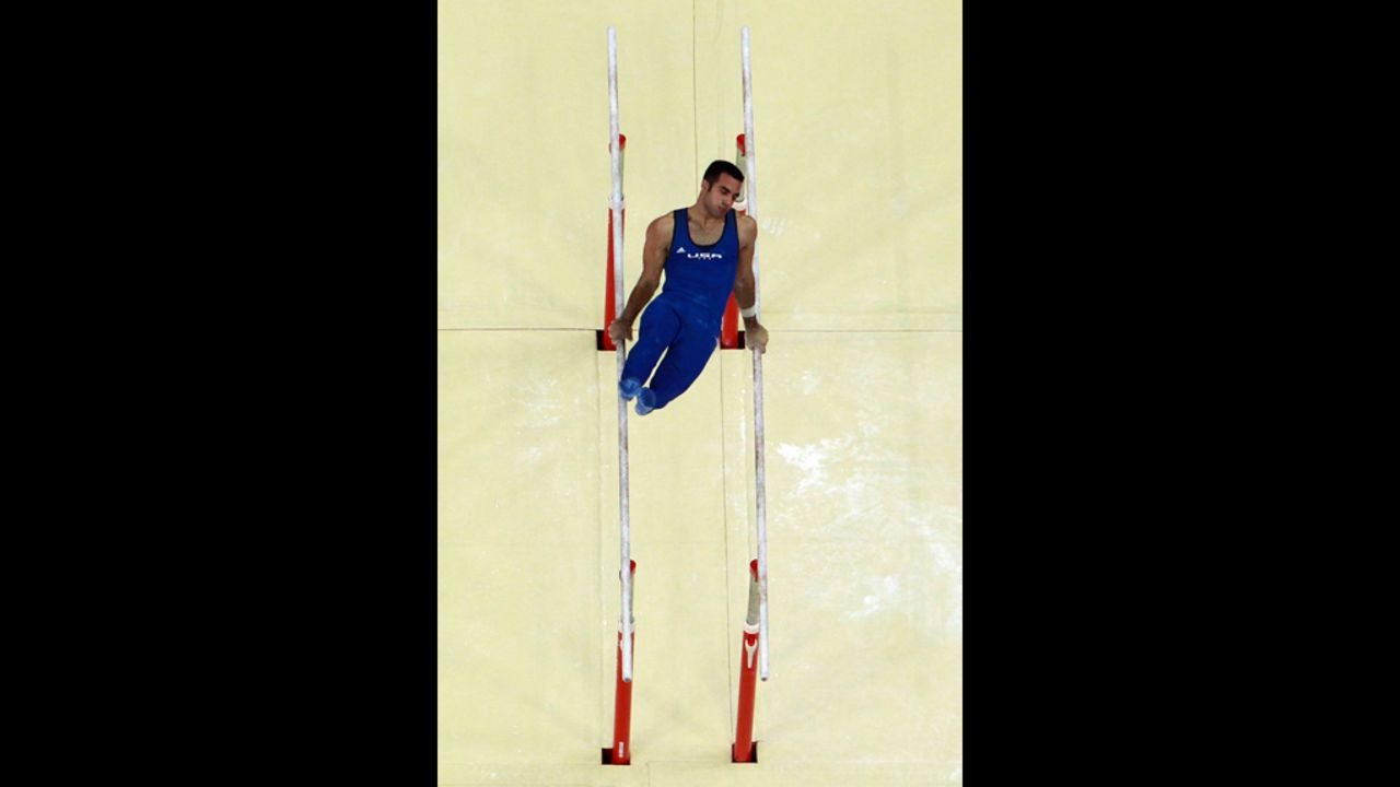 Danell Leyva of the United States competes on the parallel bars in the men's individual all-around gymastics final.
