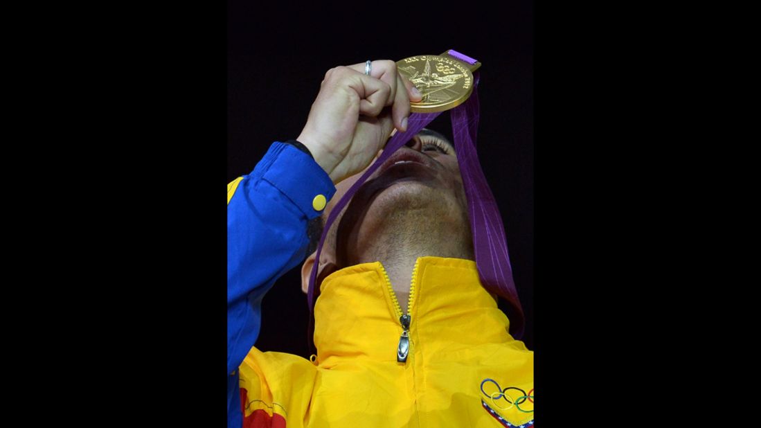 Venezuelan fencer Ruben Limardo celebrates winning the gold for men's epee. 