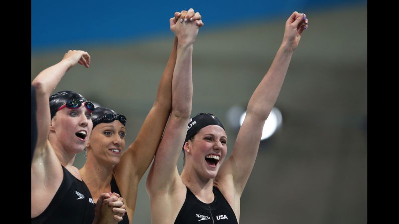 Left to right: Shannon Vreeland, Dana Vollmer and Missy Franklin  celebrate after the U.S. team won gold in the women's 4x200-meter freestyle relay.