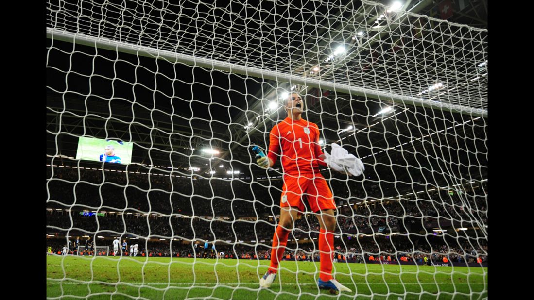 Great Britain's goalkeeper Jack Butland celebrates winning the men's football match against Uruguay in Cardiff, Wales.