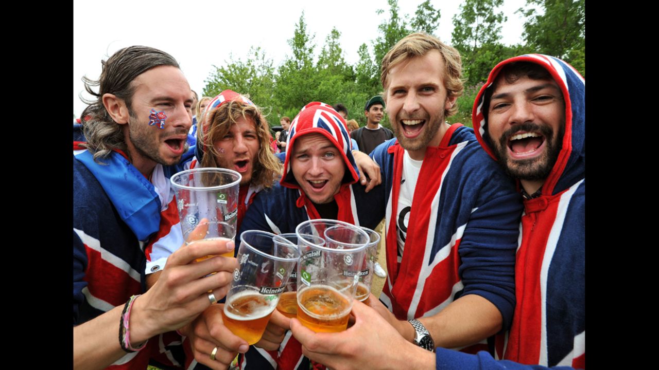 Having just won the Olympic beer-drinking medal, participants await the arrival of the Swedish bikini team.