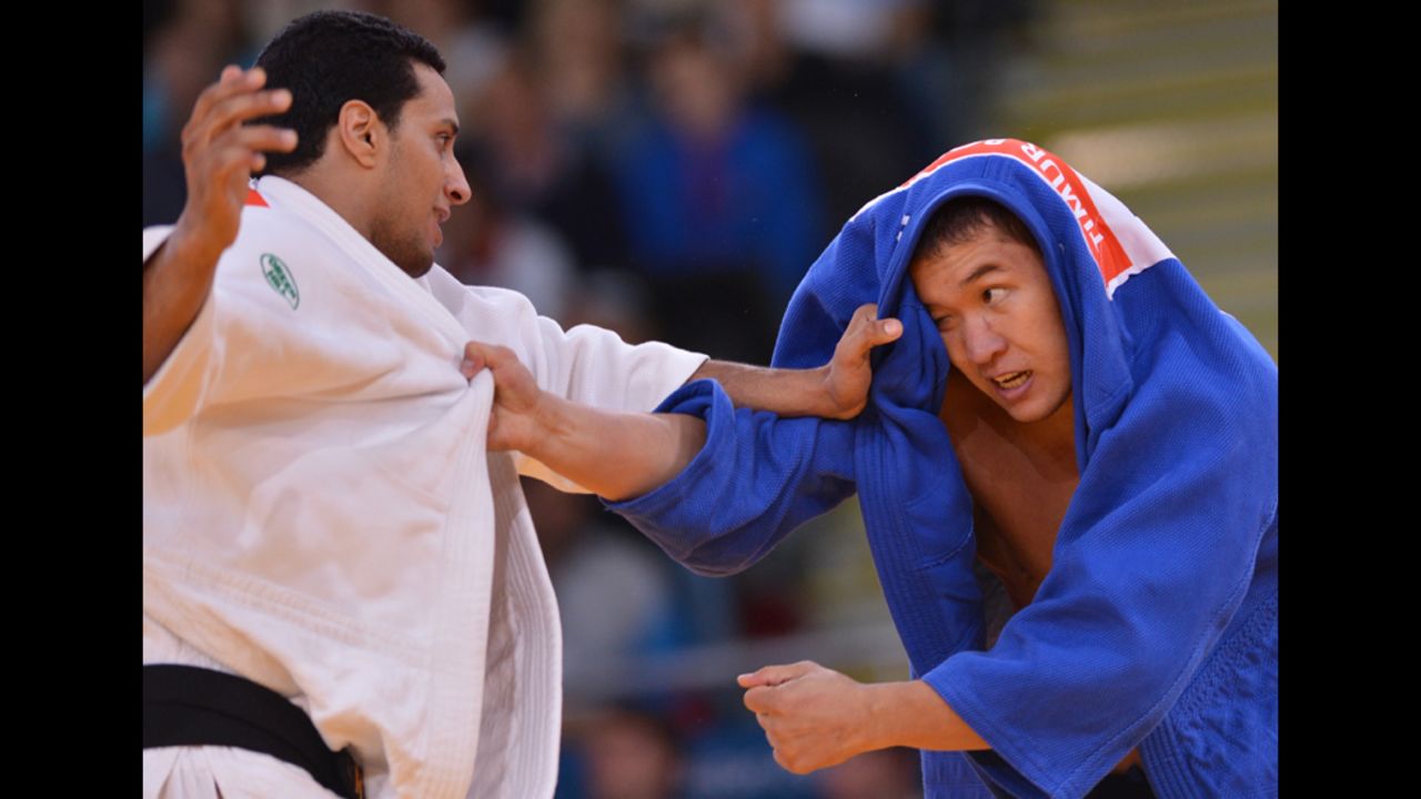Egypt's Hesham Mesbah, left, competes with Kazakhstan's Timur Bolat during their men's 90-kilogram Judo contest Wednesday.