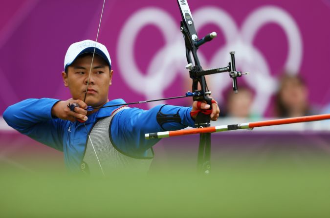Chen Yu-Cheng of Chinese Taipai competes Wednesday in the men's individual archery 1/16 eliminations match against Viktor Ruban of Ukraine. Check out photos from <a href="index.php?page=&url=http%3A%2F%2Fwww.cnn.com%2F2012%2F08%2F02%2Fworldsport%2Fgallery%2Folympics-day-six%2Findex.html" target="_blank">Day 6 of the competition.</a>