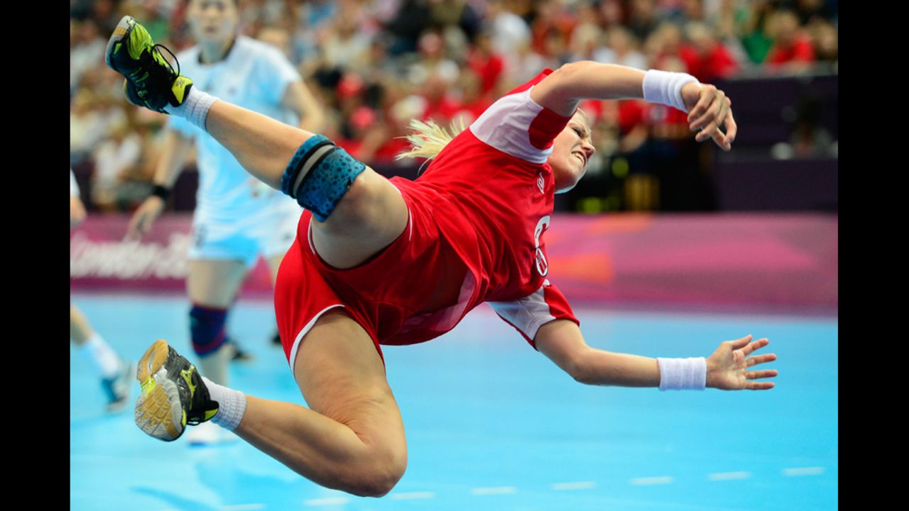 Norway's Heidi Loke jumps as she shoots during the women's preliminaries handball match against South Korea on Wednesday.