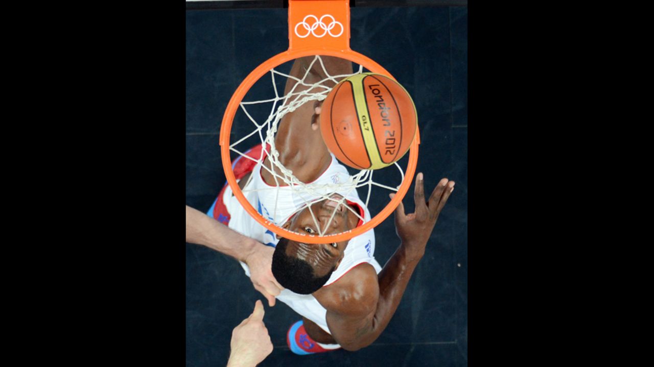 French forward Florent Pietrus eyes the ball during the men's preliminary basketball match against Argentina.