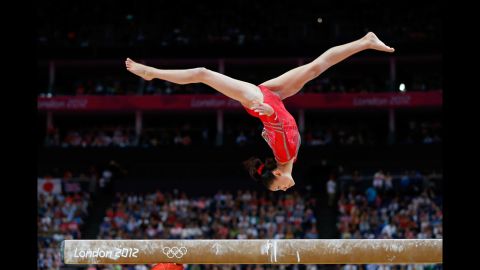Kyla Ross of the United States competes on the balance beam in the women's gymnastics team final.