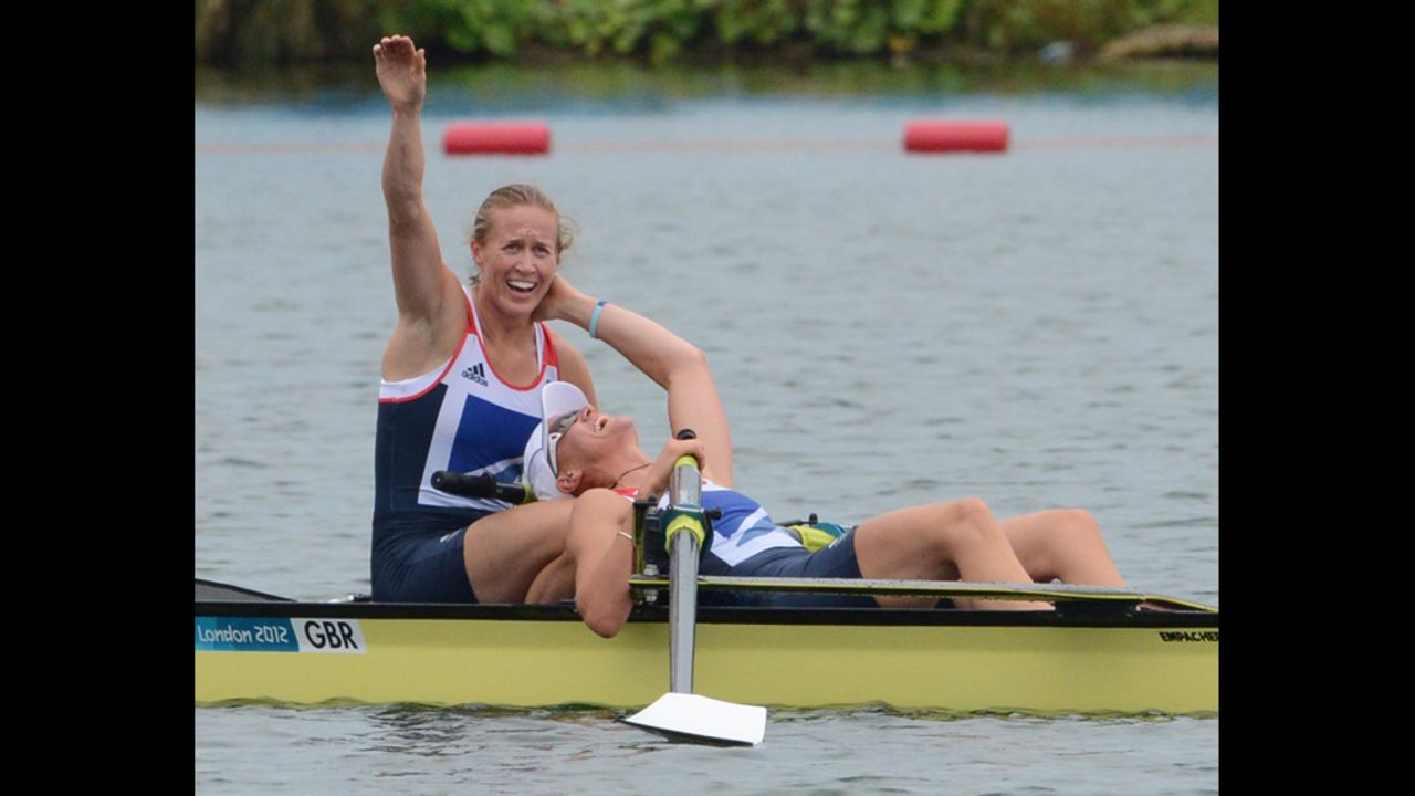 Great Britain's Helen Glover and Heather Stanning celebrate after winning gold in the women's pair final rowing event.