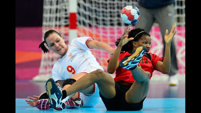 Montenegro's center back Ana Radovic, left, vies with Angola's Natalia Bernardo during the women's preliminary handball match Wednesday.