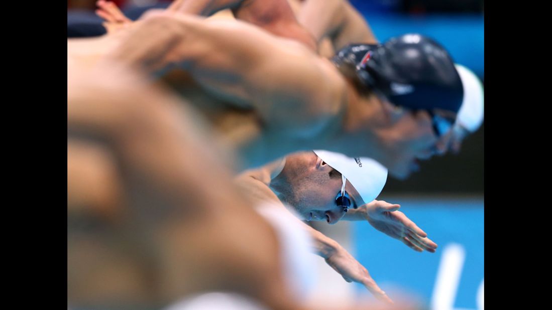 Australia's James Magnussen dives in the water at the start of the men's 100-meter freestyle.