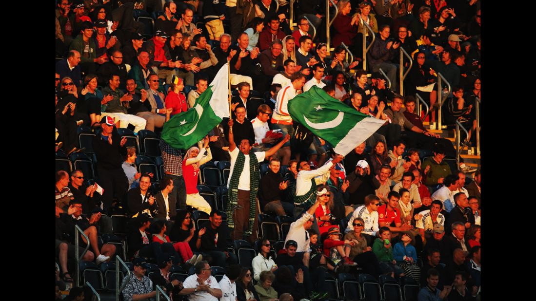 Pakistan fans show their support during the men's preliminary hockey match between Argentina and Pakistan in London.