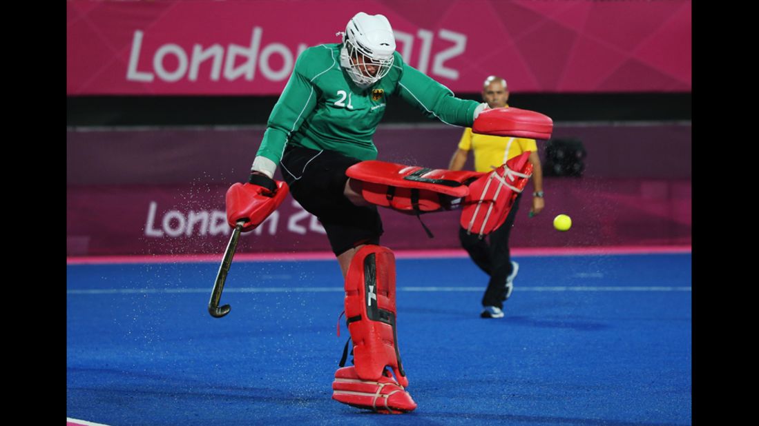 Germany's goalkeeper Max Weinhold clears the ball during the men's preliminary hockey match against South Korea.