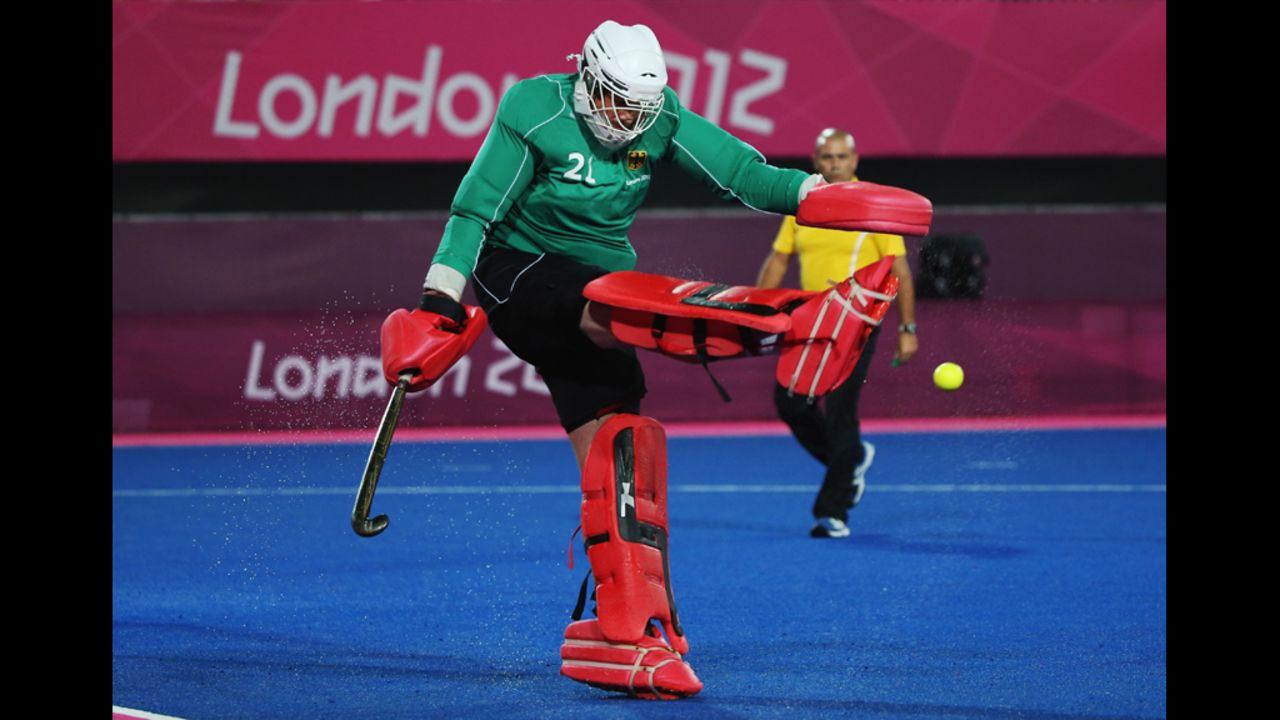 Germany's goalkeeper Max Weinhold clears the ball during the men's preliminary hockey match against South Korea.