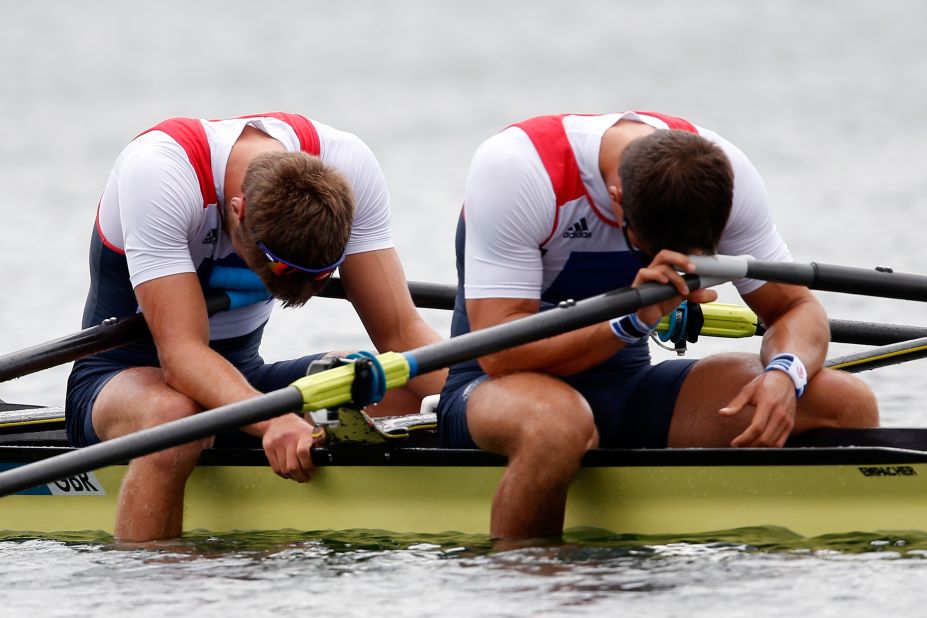 Britain's Bill Lucas and Sam Townsend appear downcast after finishing the men's double sculls final.