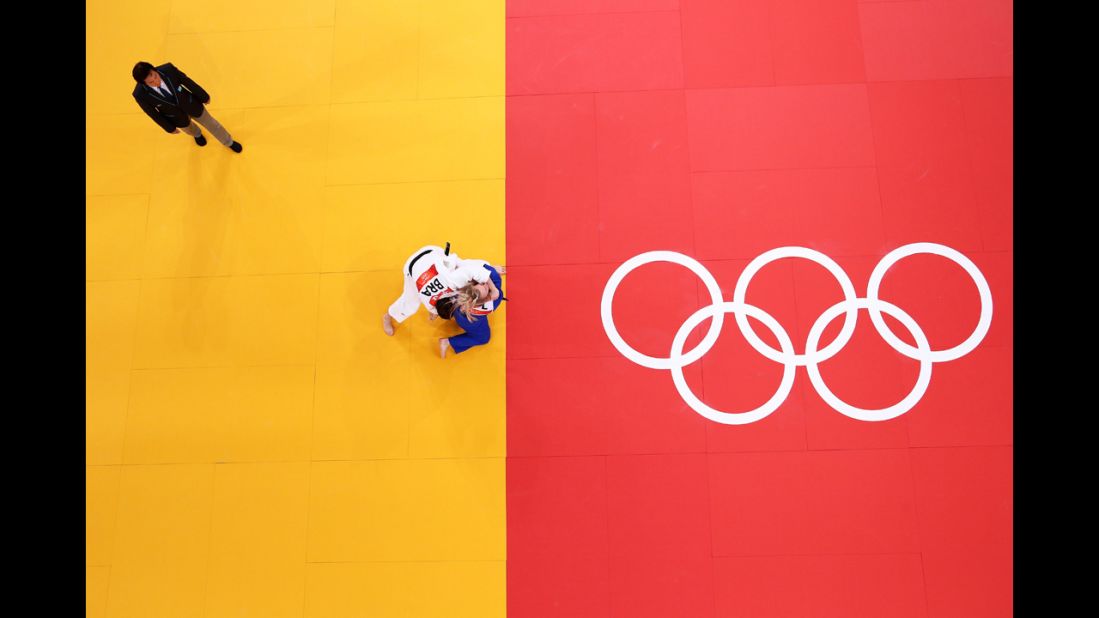 Brazil's Mayra Aguiar, in white, and Daria Pogorzelec of Poland compete in the women's under 78-kilogram judo event.