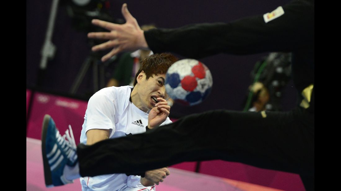 South Korea's Jeong Han shoots during the men's preliminary  handball match against Spain.