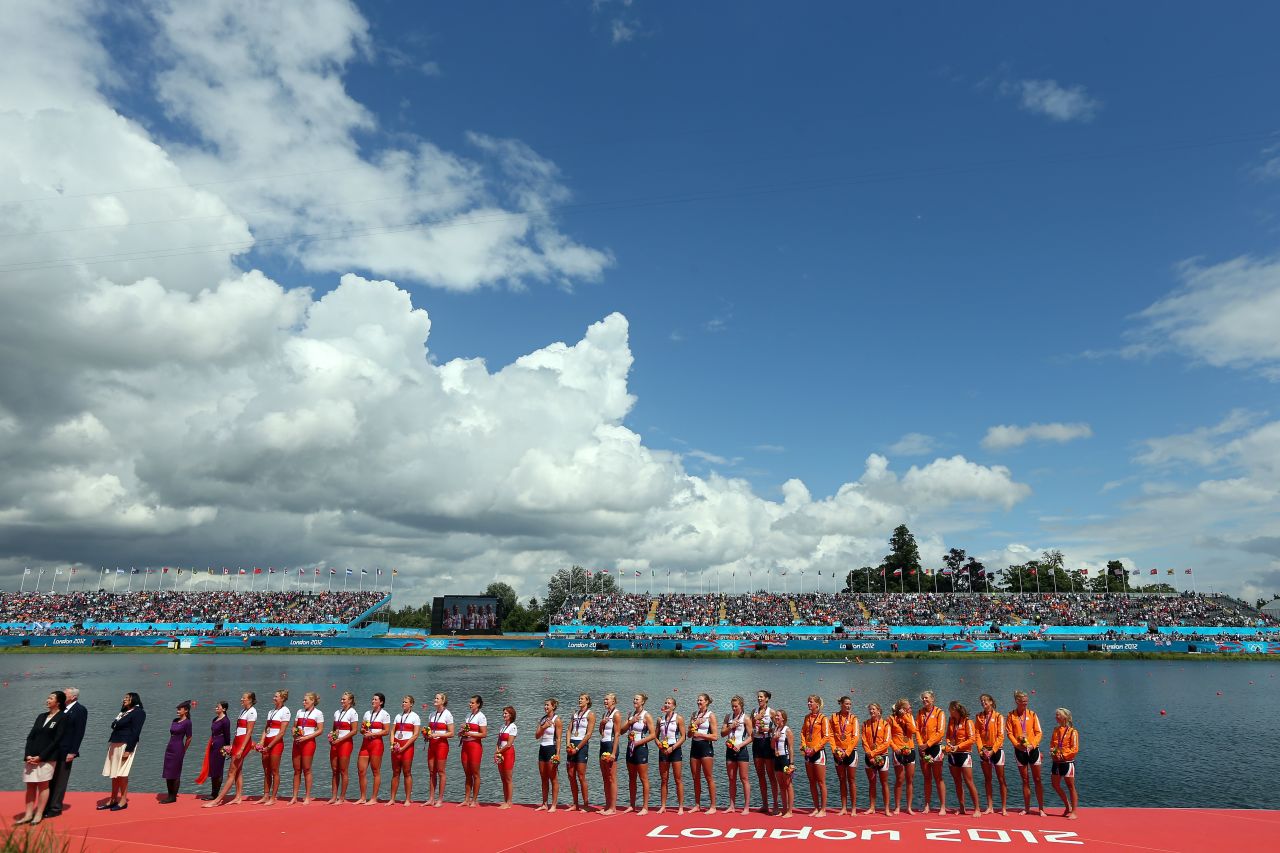 Members of the gold medal-winning U.S. team, the silver medal-winning Canadian team and the bronze medal-winning Dutch team line up during the medal ceremony.