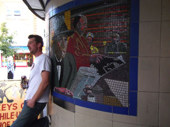 Leytonstone tube station in East London is decorated with mosaic murals featuring scenes from the life of director Alfred Hitchcock, who was born nearby, and his movies.