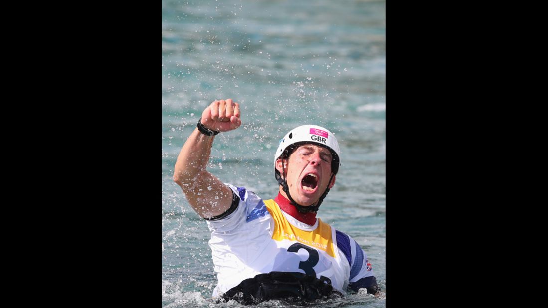 Great Britain's Etienne Stott reacts after winning gold in the men's canoe double slalom final.