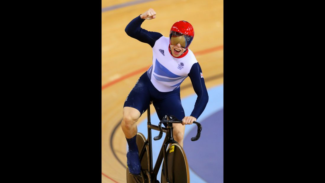Great Britain's Philip Hindes celebrates during men's team sprint track cycling qualifying against Germany.