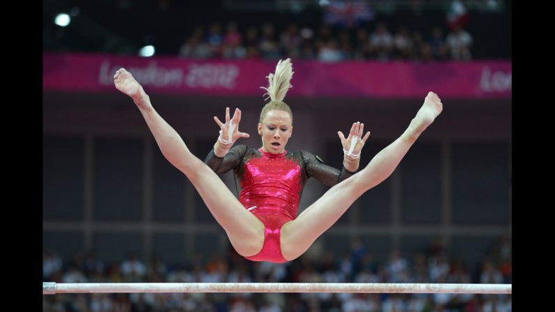 Romania's Sandra Raluca Izbasa performs on the uneven bars during the artistic gymnastics women's individual all-around final.