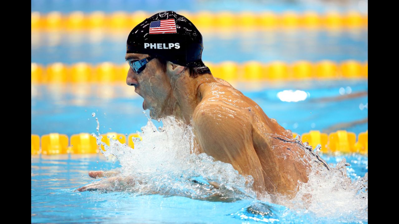 Phelps led from the first leg of the butterfly, his specialty, until he touched the wall more than a half-second ahead of teammate Ryan Lochte.