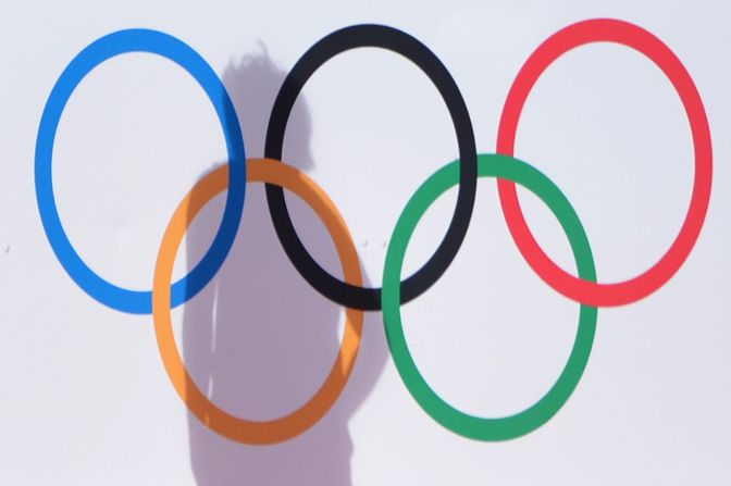 South Korea's Park Mi-hyun casts a shadow on the Olympic Rings during a women's field hockey preliminary match against Japan at the Riverbank Arena.